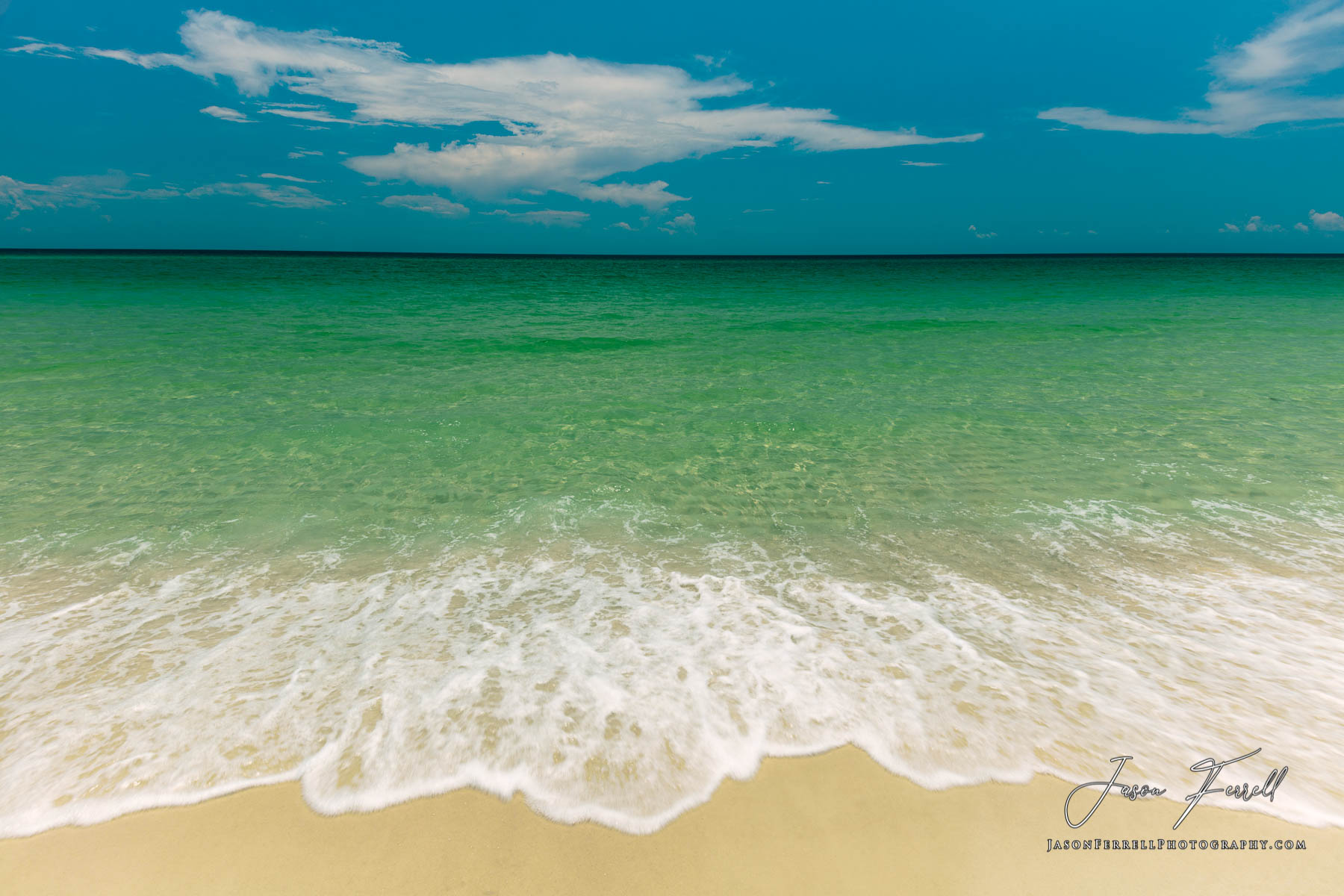 A mid summer day on the beach at Santa Rosa Island, Florida.