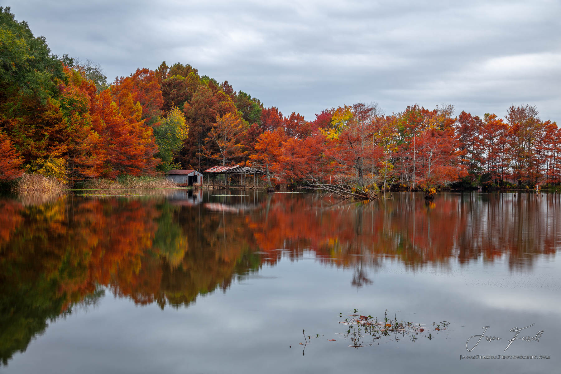 This scene holds the full spectrum of autumn colors which are perfectly reflected in this calm lake.&nbsp; Tucked away and&nbsp...